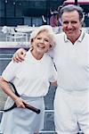 Portrait of Mature Couple on Tennis Court