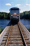 Front View of Passenger Train Crossing Black Creek Near Jacksonville, Florida, USA