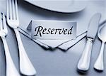 Place Setting with Reserved Sign