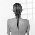 Back View of Nude Woman with Wet Hair