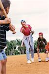 Mother and Children Playing Baseball