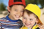 Portrait of Boy Wearing Baseball Cap Backwards - Stock Photo - Masterfile -  Rights-Managed, Artist: Dan Lim, Code: 700-00057787