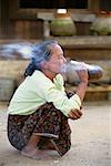 Mature Woman Smoking Cheroot Outdoors Bagan, Myanmar