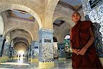 Monk Standing in Mandalay Hill Pagoda Mandalay, Myanmar