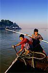 Men in Boat on Ayeyarwady River Near Sagaing, Myanmar