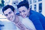 Portrait of Couple Embracing Outdoors