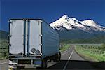 Rear View of Transport Truck on Highway 97 Mt Shasta, California, USA