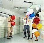 Business People with Balloons