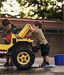 Children Fixing Car