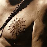 Close-up of Tattoo on Native American Man's Chest