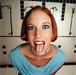 Young Woman Showing Tongue Ring