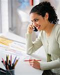 Portrait of Woman at Drafting Table on Telephone