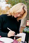 Woman Writing in Agenda