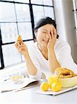 Woman Eating Breakfast