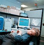 Man Sleeping at Desk