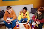 Teenagers Eating Pizza