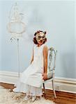 Girl with Cat Mask and Birdcage