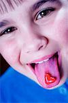 Girl with Candy Heart on Tongue
