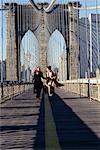 Young Couple Crossing Bridge