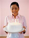 Woman Holding Birthday Cake