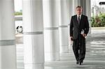 Businessman on Train Platform