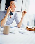 Woman Talking on Telephone