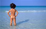 Child Looking at Beach Horizon