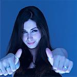 Young Woman Giving Thumbs Up