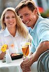 Couple Eating at Outdoor Cafe