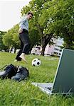 Businessman in Park, Playing Soccer