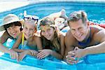 Family in Swimming Pool