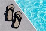 Sandals by Swimming Pool