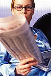 Woman Reading Newspaper