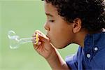 Boy Blowing Bubbles