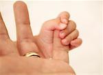 Father and Baby's Hand