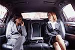 Business Women in Limousine