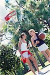 Two Women Playing Basketball