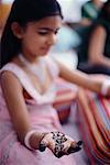 Girl with Mehandi on Hand