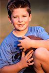 Portrait of Boy with Football