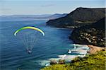 Parachuting from Bald Hill Lookout, Bald Hill Headland Reserve, Illawarra, Wollongong, New South Wales, Australia