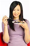 Woman Holding Plate of Food