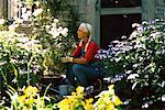 Woman Sitting in Garden