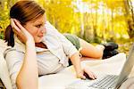 Woman Lying Down with Laptop