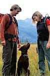 Couple Hiking with Dog