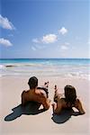 Couple Lying on Beach