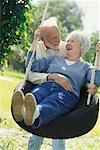 Couple on Tire Swing