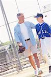 Father with Son on Baseball Diamond