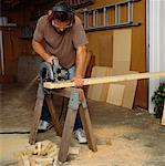 Man Cutting Wood