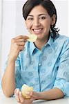 Woman Eating Potato Chips