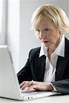 Woman Using a Laptop Computer